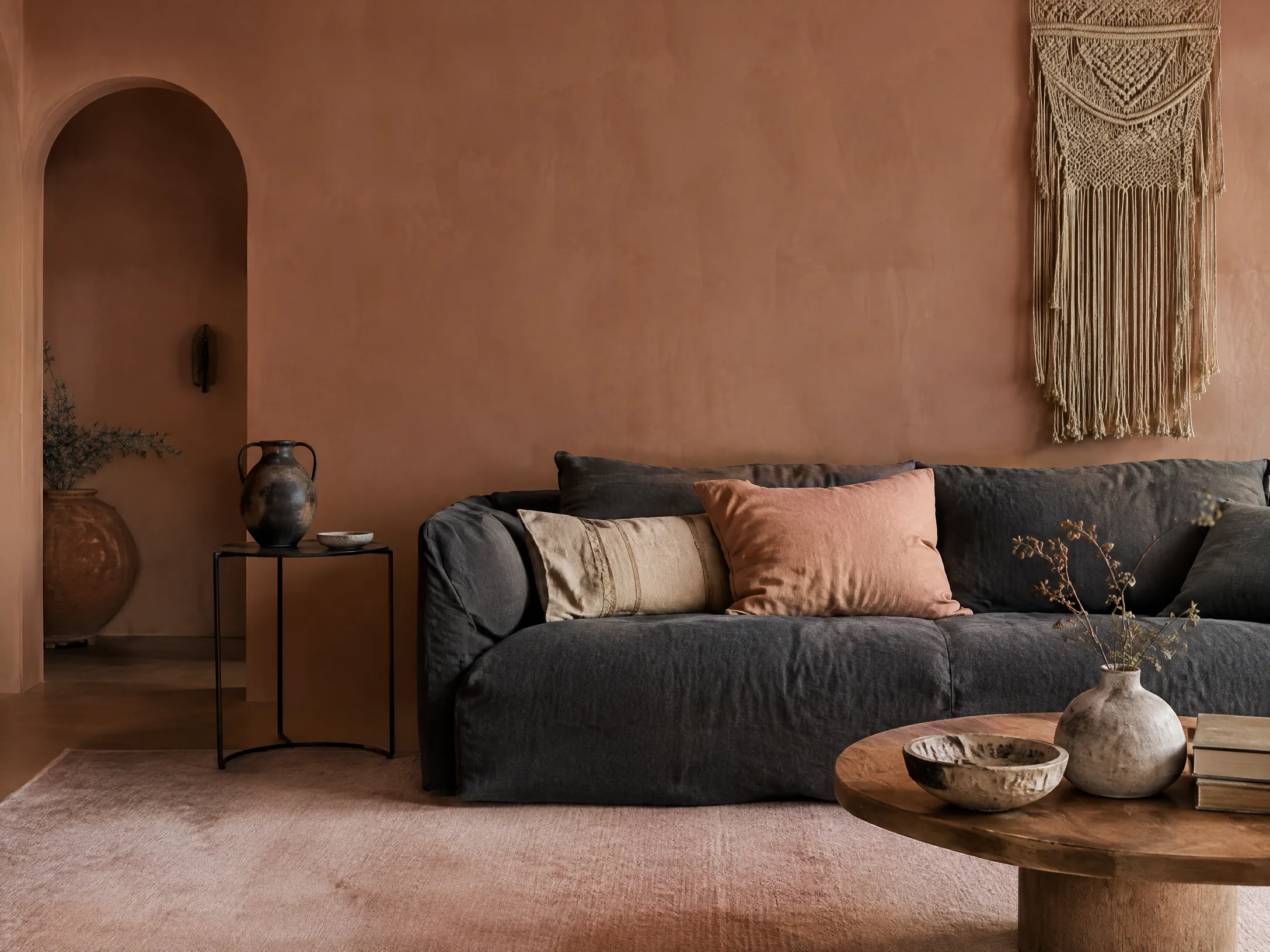 Blush clay and charcoal modern boho living room